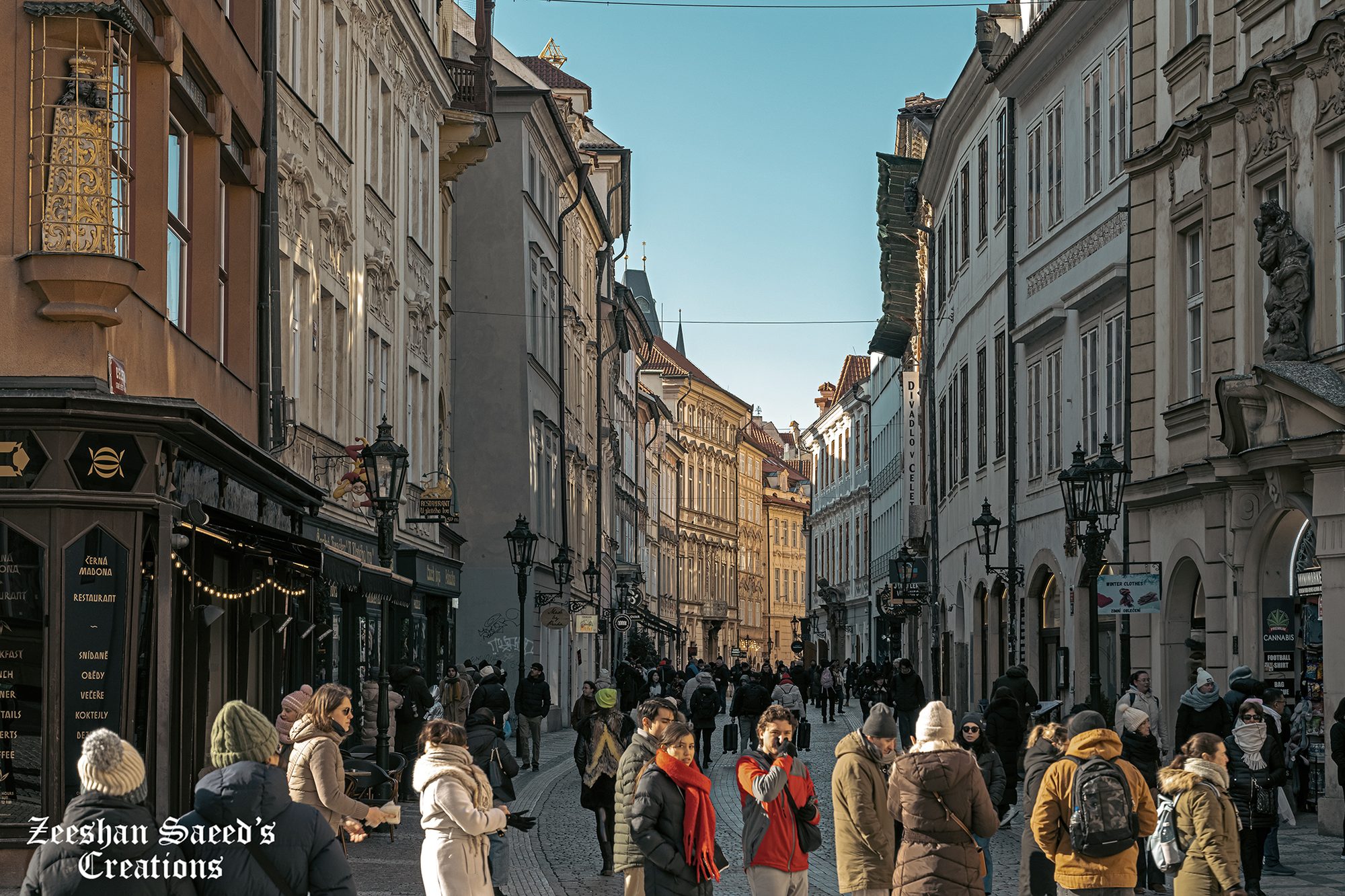 Winter crowds on a narrow Old Town street in Prague