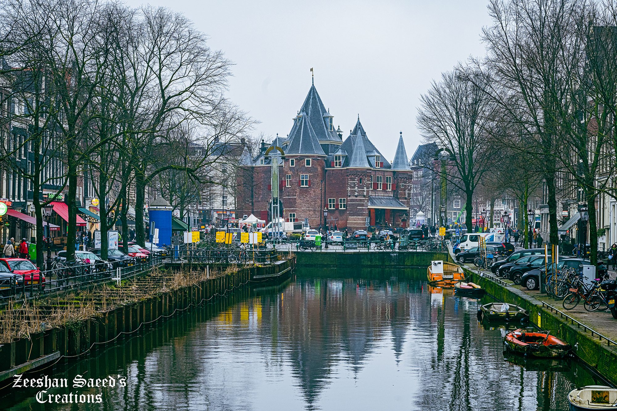 Waag viewed down the Kloveniersburgwal canal in Amsterdam