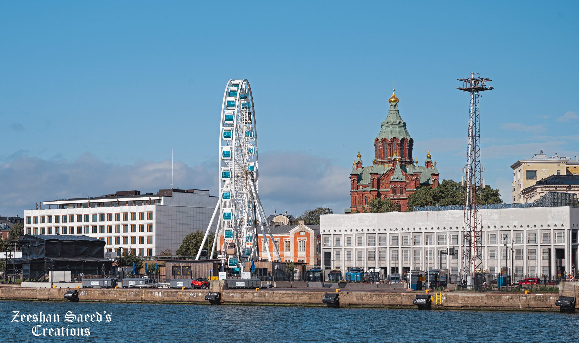 SkyWheel and Uspenski Cathedral from the water