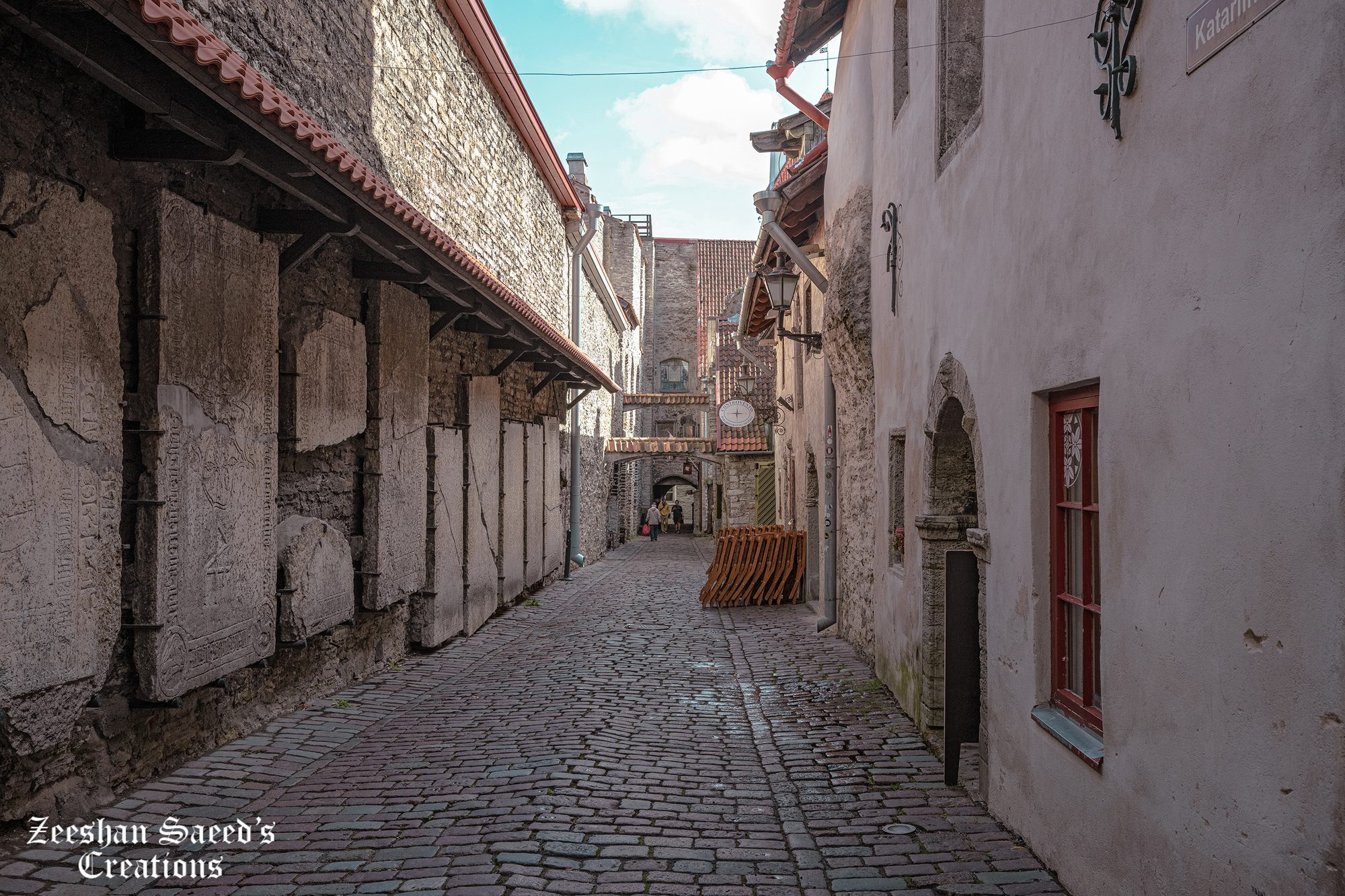 St. Catherine's Passage, with old gravestones set into the wall