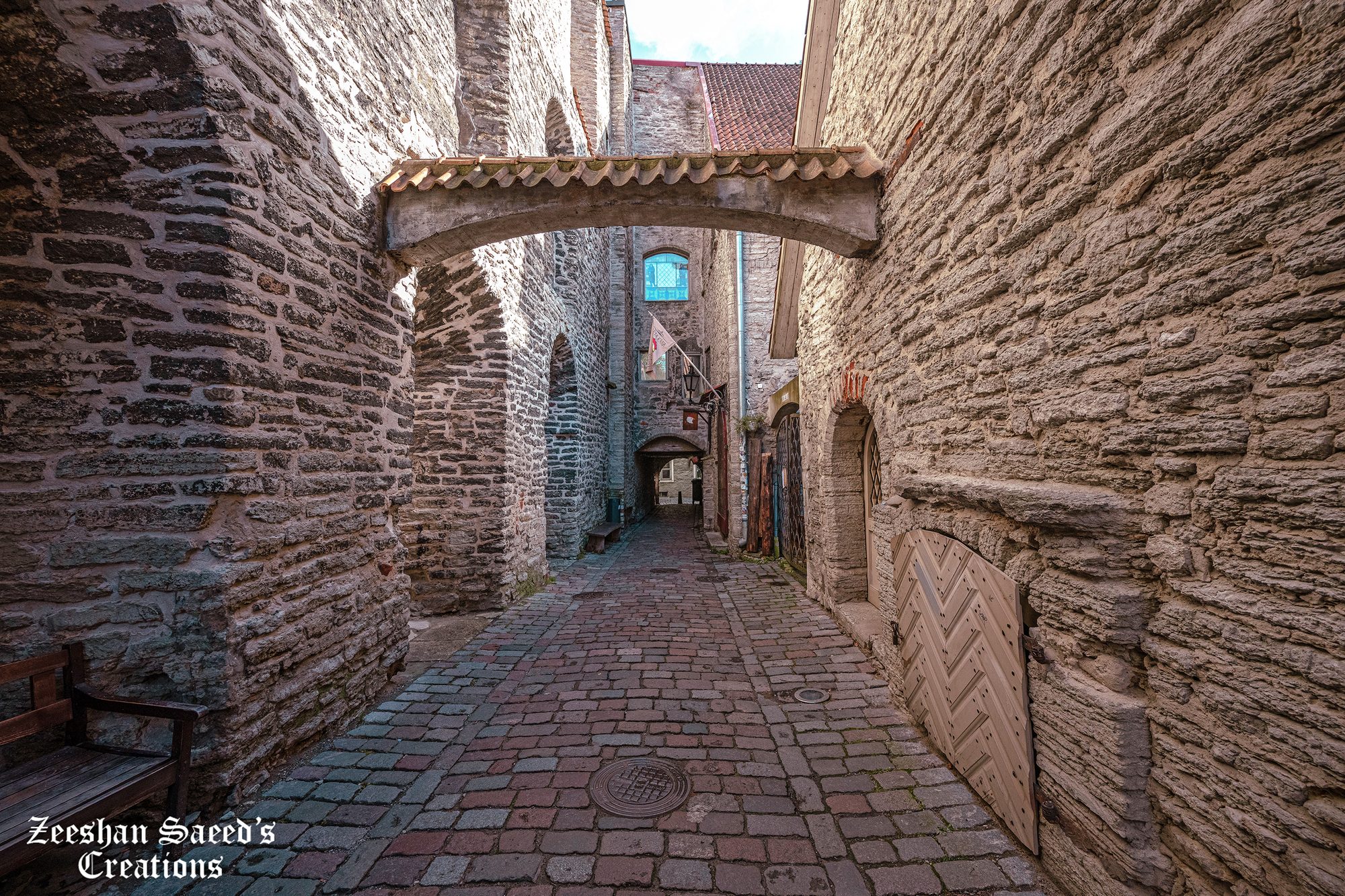 Stone arch over a narrow Old Town lane