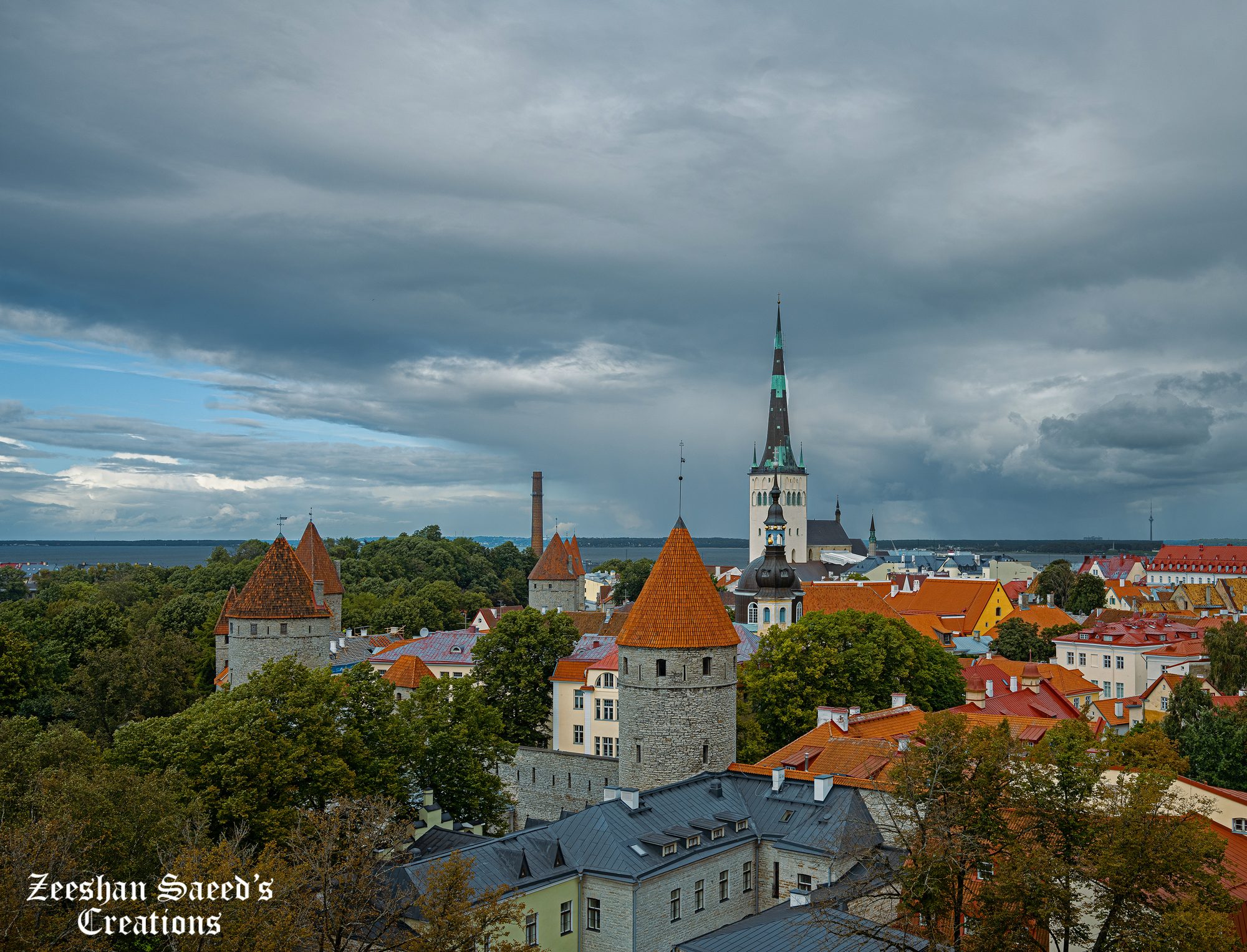 Towers of the town wall under stormy skies