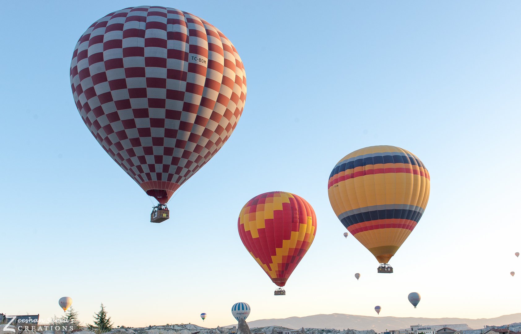 Hot-air balloons up close at dawn